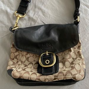 Brown and black coach purse